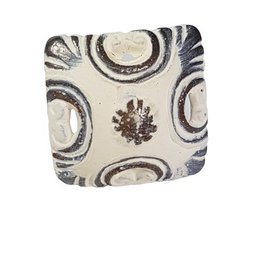 Square cream fabric knob with navy blue circular patterns and floral motifs, vintage style door hardware