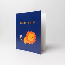 "Colorful birthday card with a cheerful lion design and the text 'alles gute!' (German for 'all the best!'). The card is available in various pack sizes, making it a versatile option for birthday celebrations."