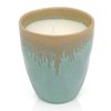 Steengoedkaars in een turquoise espressokopje