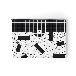 A black and white pencil case with a grid pattern and speckled design, suitable for makeup storage or organization.