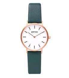 Rose gold watch with a petite, minimalist design and a green leather strap.