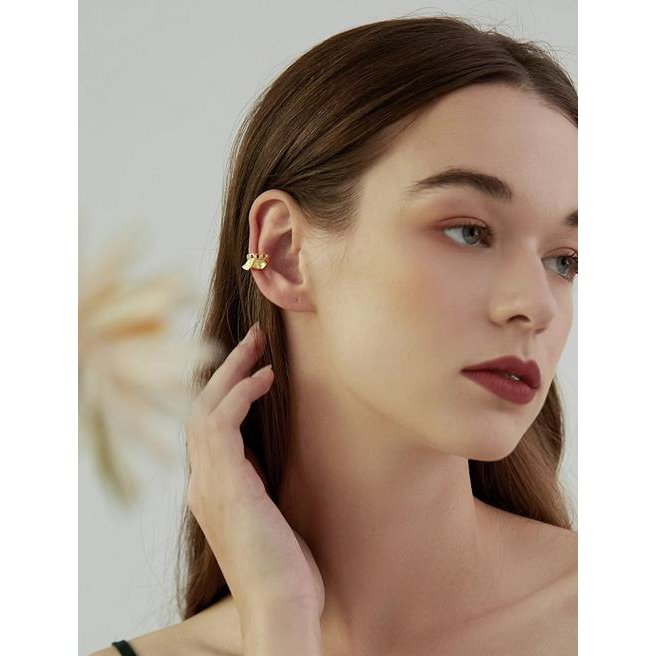 Polsino auricolare dal design unico della gonna: un pezzo