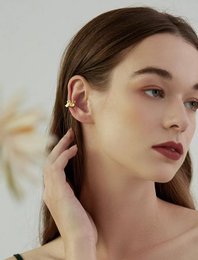 Polsino auricolare dal design unico della gonna: un pezzo