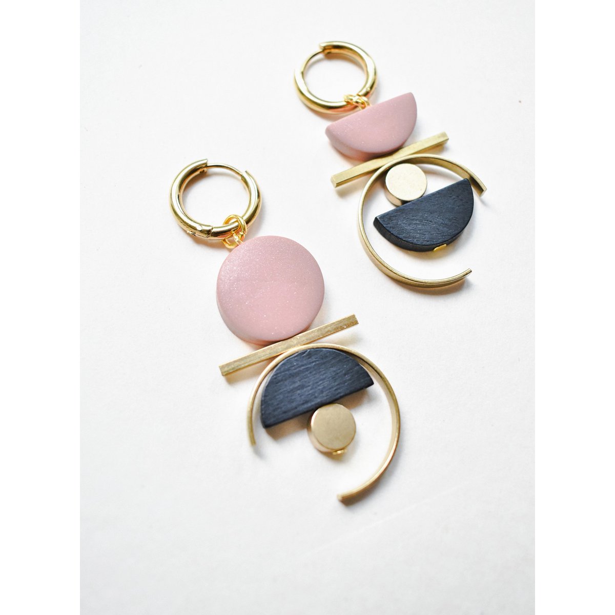 Asymmetrical dusty rose dangles