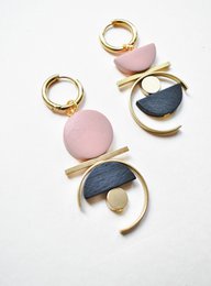 Asymmetrical dusty rose dangles