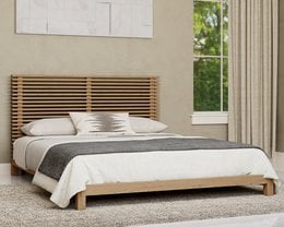 Flaxen-colored platform bed with slatted headboard, made of wood, suitable for a super king-sized mattress.