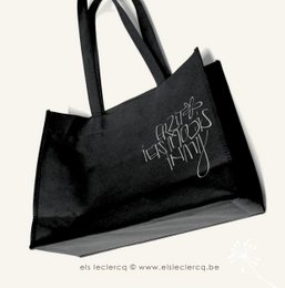  Black shoulder bag with text "Fruit Jerks in Vinyl" printed on it.
