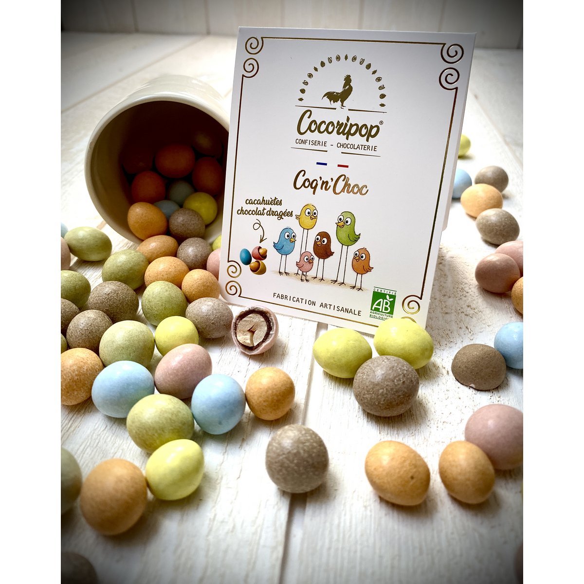 Coq 'n' shock (peanut chocolate dragee)