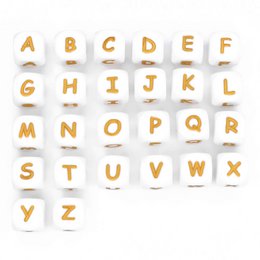 Square white and gold silicone letter beads. Suitable for DIY jewelry making, crafts, and personalized accessories.