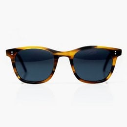 Retro-inspired square sunglasses with a tortoiseshell frame and blue gradient lenses.