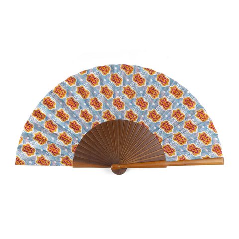 Handgemaakte zijden ventilator met geometrisch Ikat -patroon in levendige kleuren