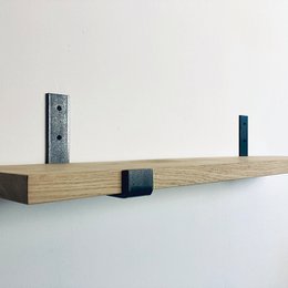  Natural wood book stand with U-shaped metal supports.
