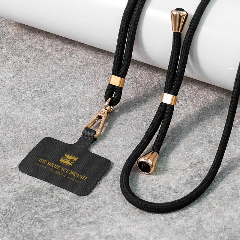 Universelle mobile bands i sort og guld