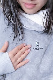 Poncho sport à capuche KoKoon – après sport & récupération – chaleur immédiate – fitness, danse, rugby – ultra doux – taille universelle
