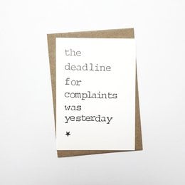 A greeting card with the text "the deadline for complaints was yesterday" printed on it.