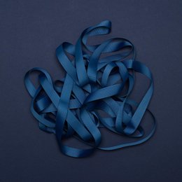 Midnight blue ribbon with "My Pretty Circus" text printed on it. Soft, flexible material suitable for various craft and decorative uses.