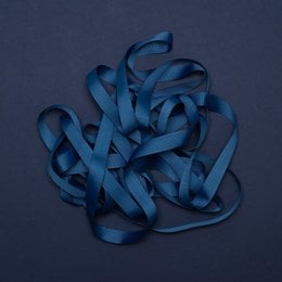 Midnight blue ribbon with "My Pretty Circus" text printed on it. Soft, flexible material suitable for various craft and decorative uses.
