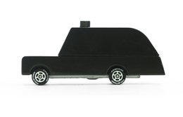 Black London taxi cab toy car, classic boxy shape, white wall tires, yellow taxi sign detail.