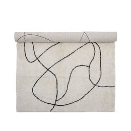 A white cotton rug with abstract black line patterns, suitable for a child's room.
