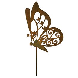 Vintage-style garden decoration featuring a butterfly-shaped metal sculpture with intricate floral and scroll designs. The sculpture has a rustic, patina finish and is mounted on a metal stake for easy placement in a garden or outdoor space.