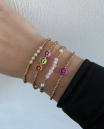  Satin cord bracelets in brown, beige, and green colors. The bracelets feature a simple, minimalist design with metal accents.