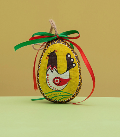 Small yellow Easter Egg with a bird