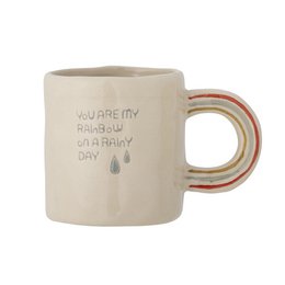 Stoneware mug with a nature-inspired design featuring clouds, raindrops, and a rainbow. The mug has a warm, earthy color palette and a textured surface.