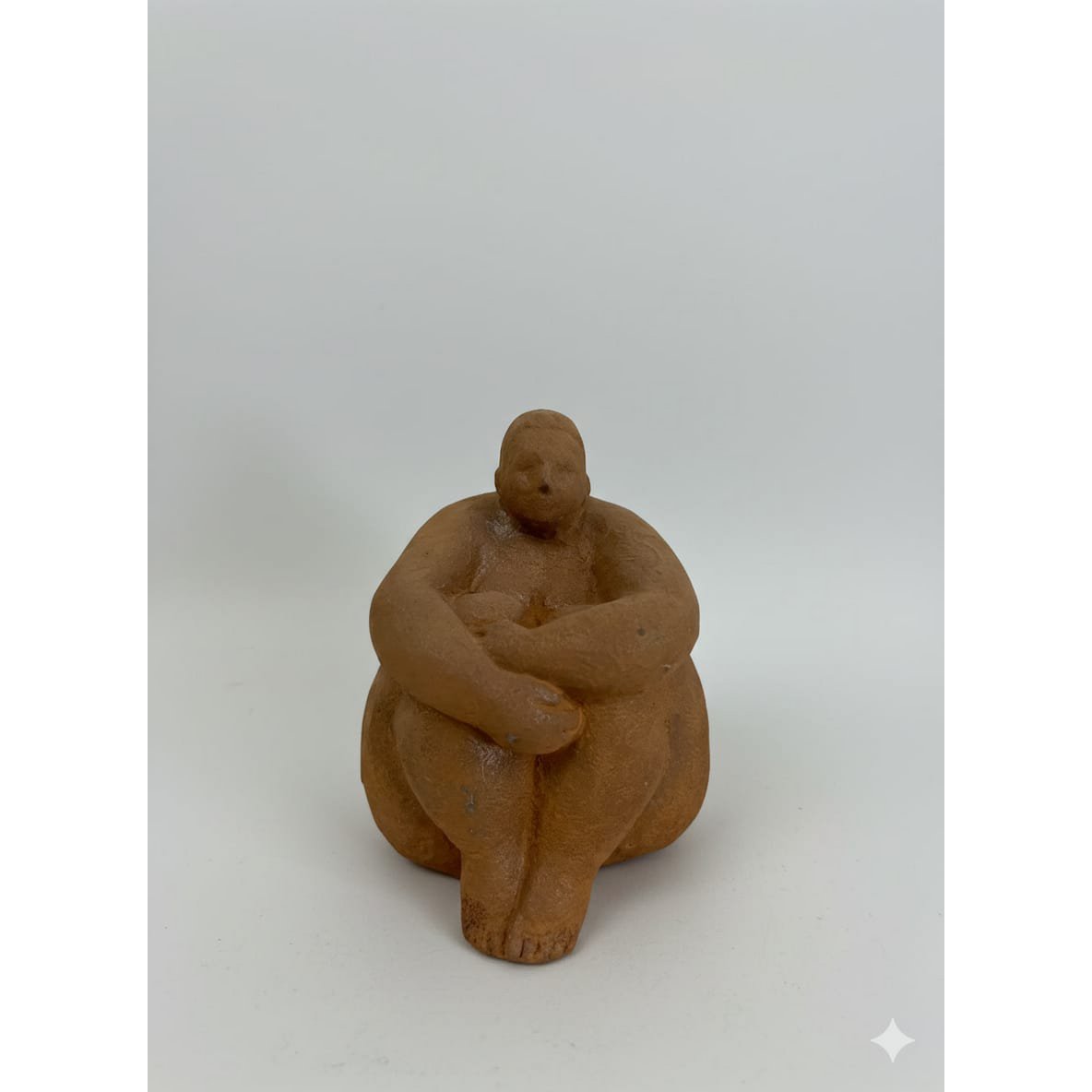 Femme assise en fonte, 12x14x16cm, 2,5kg