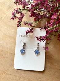 Silver diamond drop earrings with real forget-me-not flowers