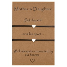 Mother and daughter matching bracelets, heart charm, adjustable black cord, family connection gift.