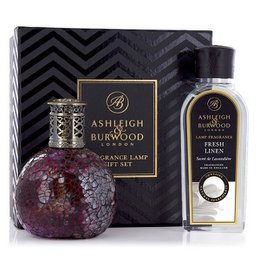 A red glass fragrance lamp with a rose bud design and fresh linen scent. The lamp is part of the Ashleigh & Burwood gemstone diffuser collection.