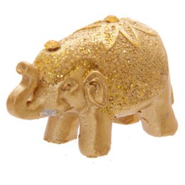 Elefante de la suerte con purpurina metálica en una mini bolsa de regalo