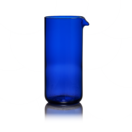 A tall, cylindrical blue glass carafe with a simple, minimalist design.