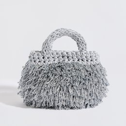 “Pebble metallic” crochet clutch with crossbody strap silver