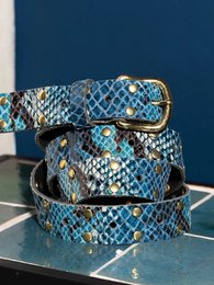  A long, leather belt with a gold-colored buckle and decorative snake-skin pattern in shades of blue and turquoise.