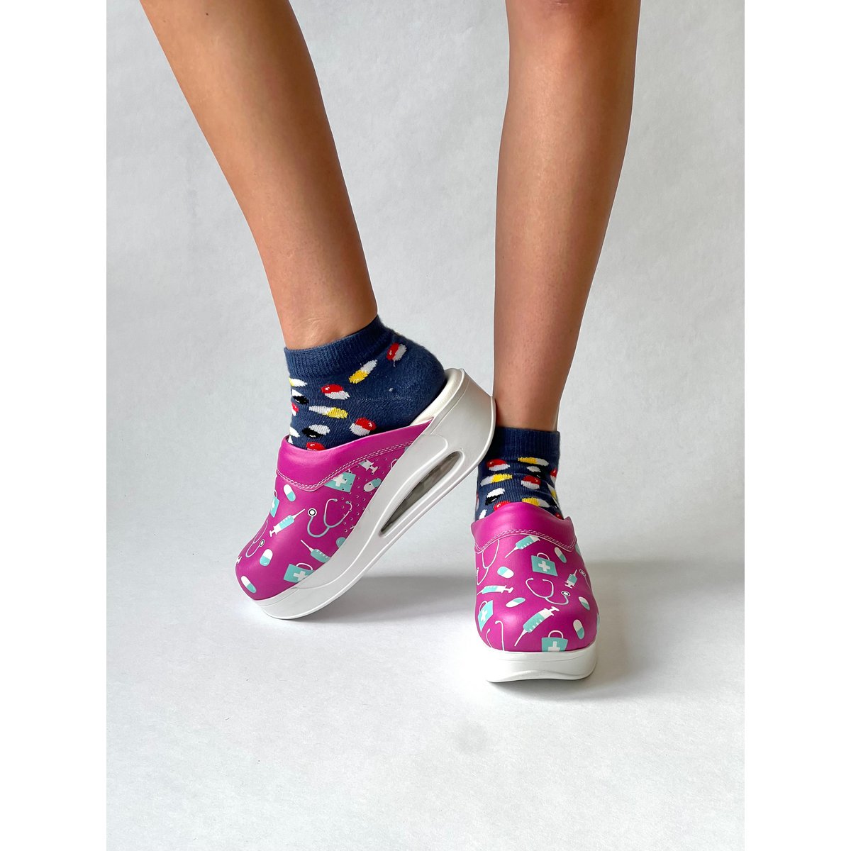 Care fuchsia airmeds clogs