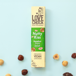 Organic vegan chocolate bar with pieces of hazelnut. Dark chocolate with a nutty flavor and crunchy hazelnut pieces.