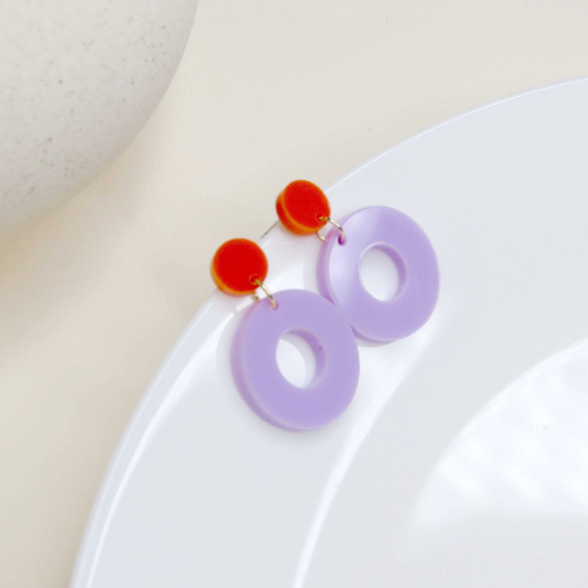 Colorblock Circle stud earrings in orange and lilac