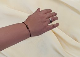 Bracciale con pietre preziose a flusso d'oro