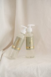 Saumur body wash, a shower gel with a fresh, citrus scent. Contains natural ingredients like orange extract.