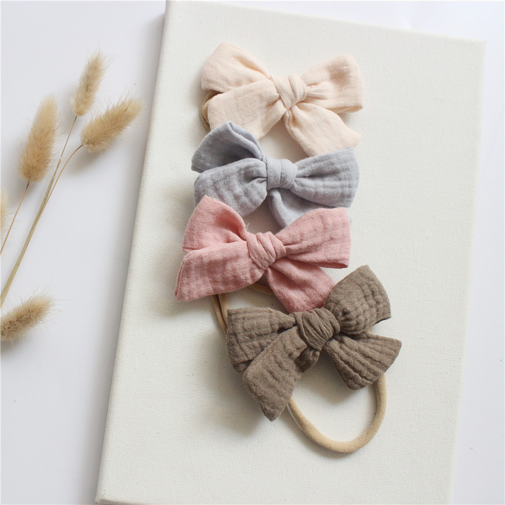 Annie & Charles® baby pandebånd sæt med muslin sløjfe