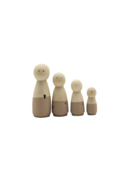 Wooden figurines in various sizes, including a girl and boy in different sizes, made of sand stone material. The figurines can be used to create a family display.
