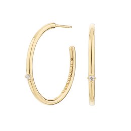 Golden hoop earrings with zirconia