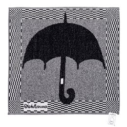 Black and white patterned kitchen towel with an umbrella design.