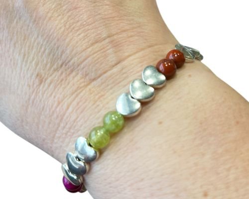 Women's bracelet with a mix of natural stones 6 mm and silver-colored hearts