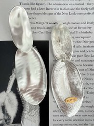 Meia silver colored statement earrings