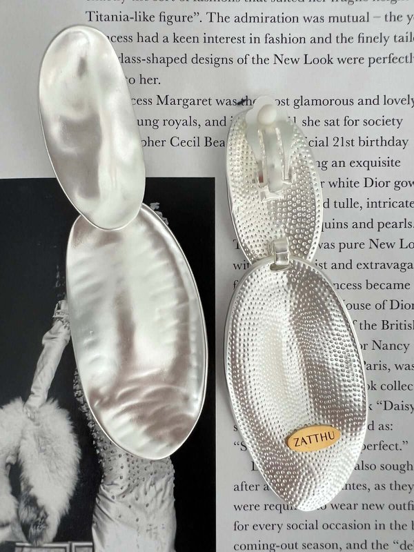 Meia silver colored statement earrings