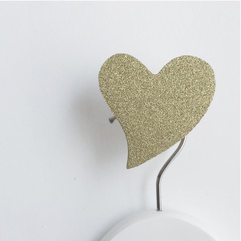 HET GOUD SCHITTERT HART MUURHAAK