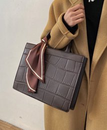 Elegant leather handbag/shoulder bag in black or coffee brown colors, featuring a structured design with a top handle and detachable shoulder strap for versatile wear.