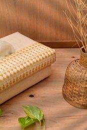 Handwoven tissue box, natural woven rattan material, rectangular shape, beige cream color, bohemian style